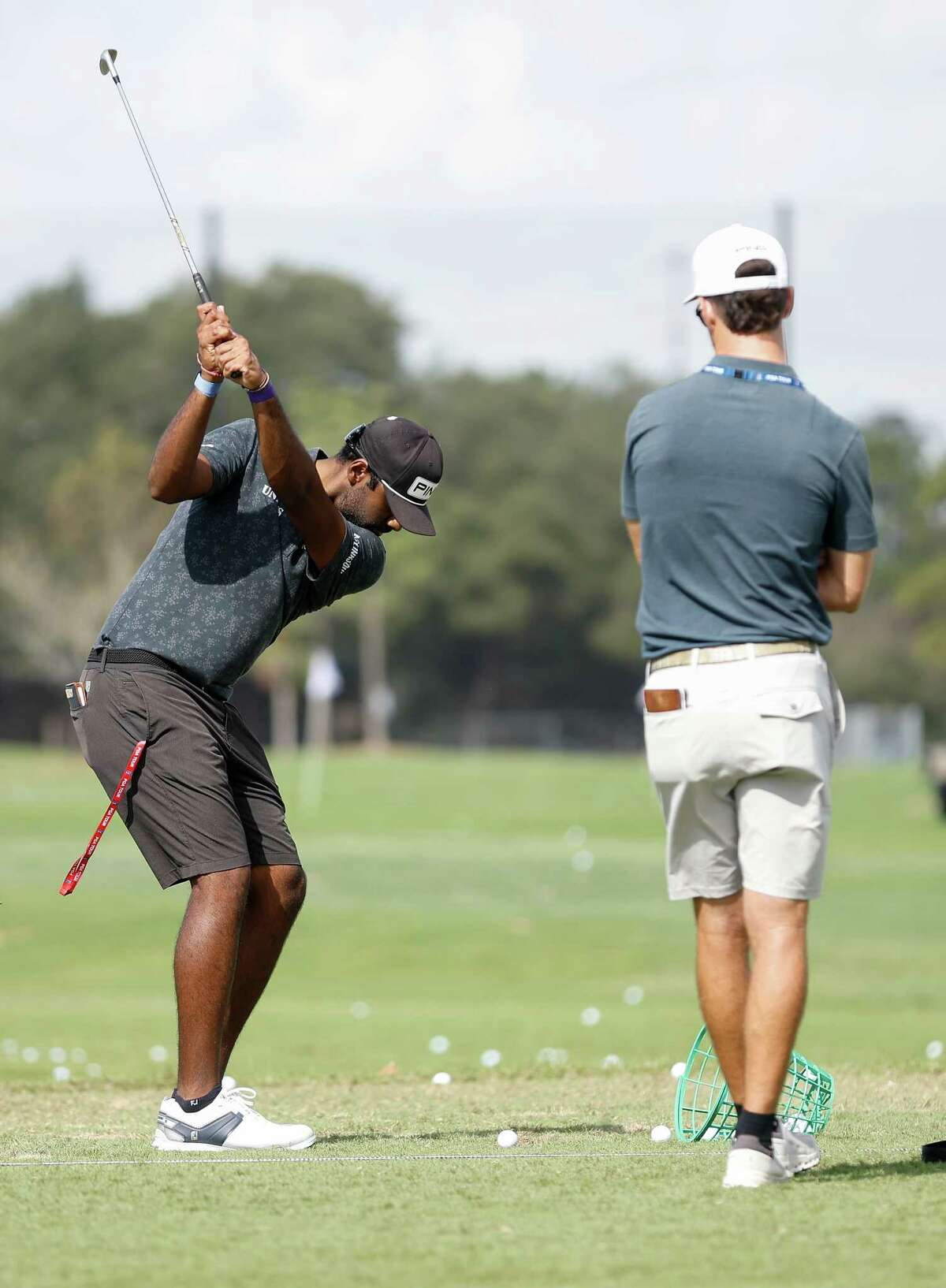 Sahith Theegala is seen on the driving range after his round at the Houston Open Pro-Am at Memorial Park Golf Course in Houston, TX on Wednesday, November 9, 2022.