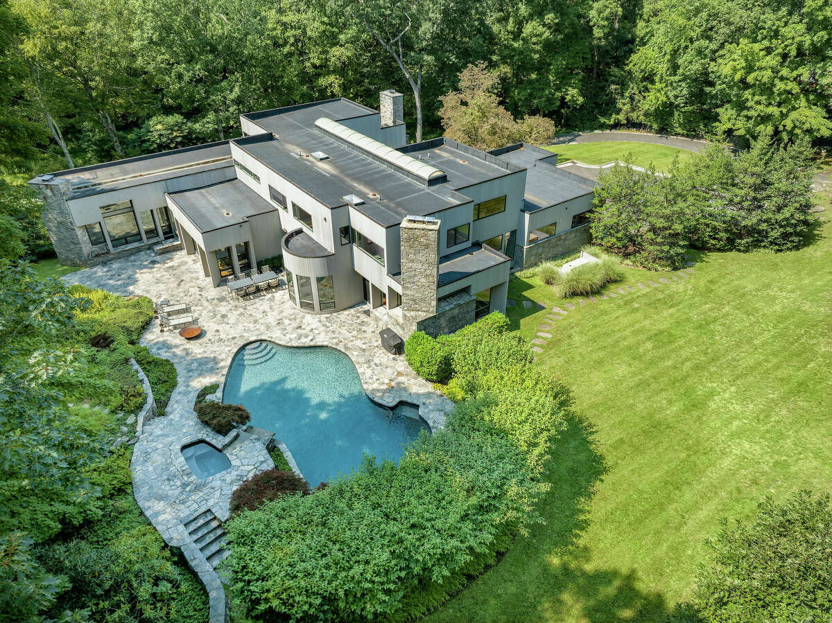The home on 49 Vineyard Lane in Greenwich, Conn. has six bedrooms, six full bathrooms and and a FullSwing indoor golf simulator. 
