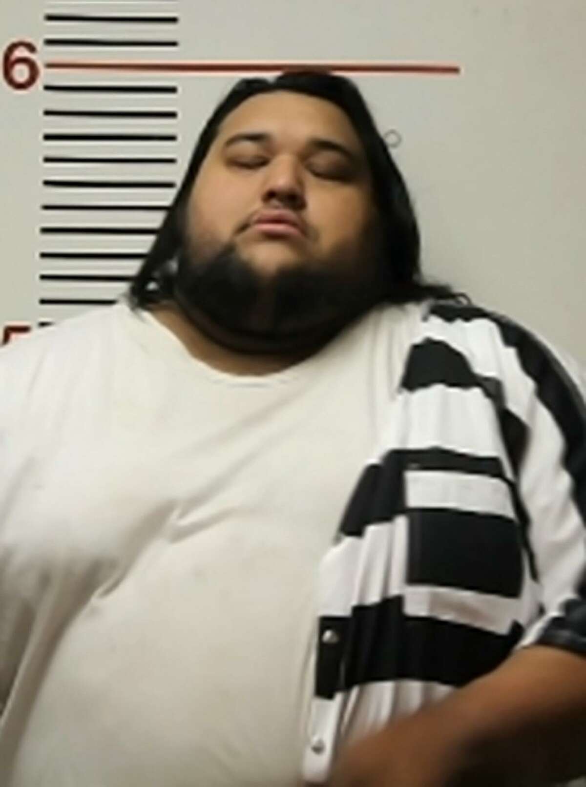 Christian Martinez was arrested in Palestine in connection with the deaths of 53 migrants in the back of a semi-truck in San Antonio.