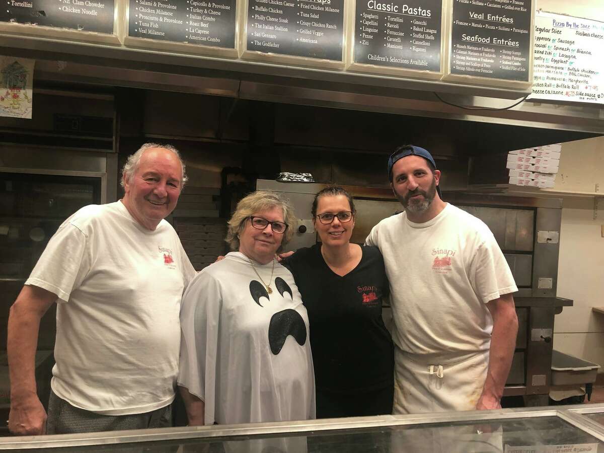Sinapi's founder, Pietro Sinapi, with his wife, Rina, daughter, Angela, and son-in-law, Dan Tripaldi, who married his daughter, Cathy. This was the last night at the pizzeria.