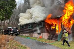 Search for hunter leads to cabin fire, rescue, arson charge