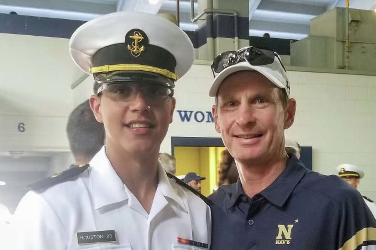 John Houston (right), UH's associate athletic director for sports medicine, will have his son Trey as the Cougars' unofficial tour guide for this week's Veterans Classic at the U.S. Naval Academy in Annapolis, Md. Trey grew up around the UH basketball program.