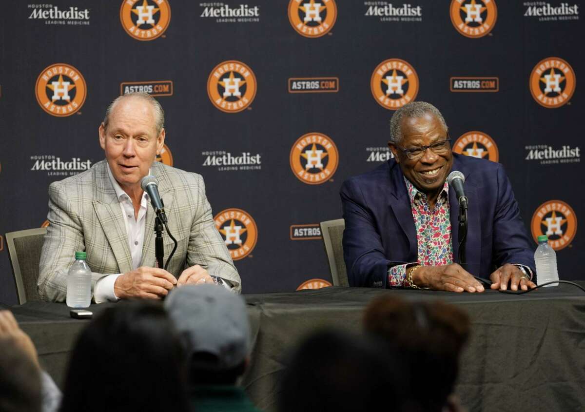 Owner Jim Crane, left, said negotiations with manager Dusty Baker on a one-year contract extension “took probably 15 minutes.” The club is involved in much lengthier talks with general manager James Click.