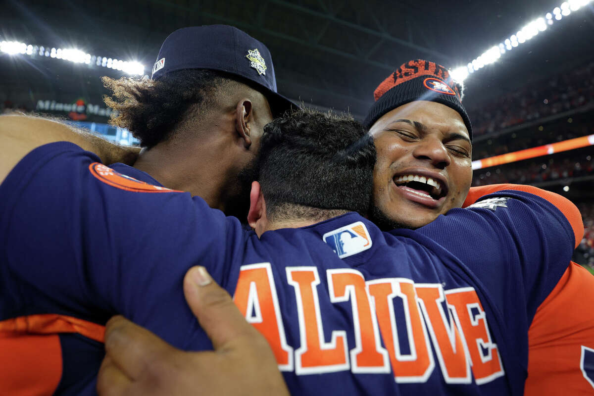 Jose Altuve #27 of the Houston Astros celebrates with teammates after defeating the Philadelphia Phillies 4-1 to win the 2022 World Series in Game 6 of the 2022 World Series at Minute Maid Park on November 05, 2022 in Houston.