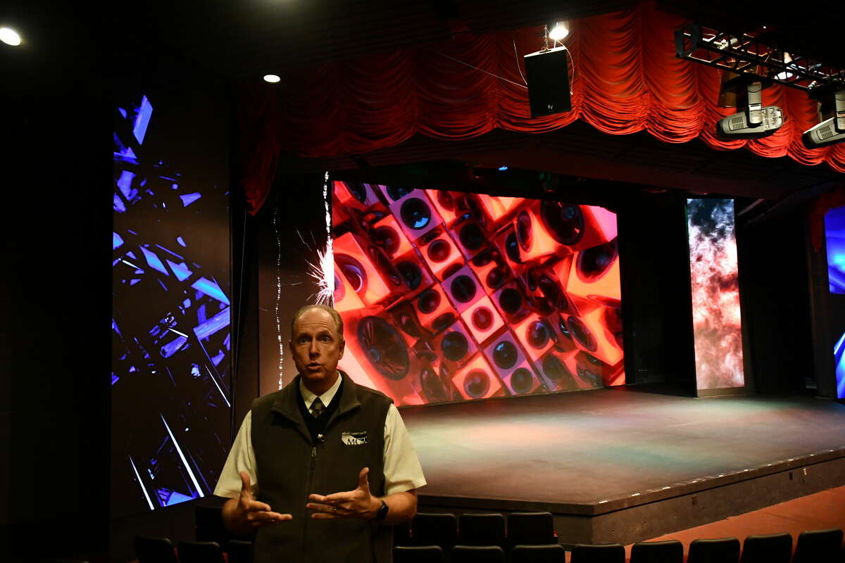 Executive Director Tim Jebsen explains the technology as each screen displays a unique moving image.