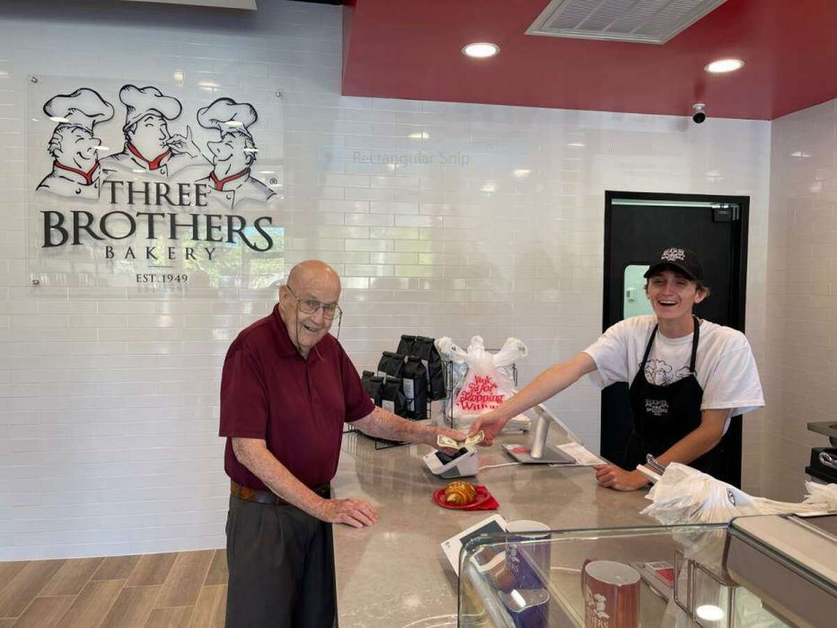 Clyde Cannon, the Three Brothers Bakery first customer from 1949, is the first customer at Three Brothers Bakery Tanglewood.