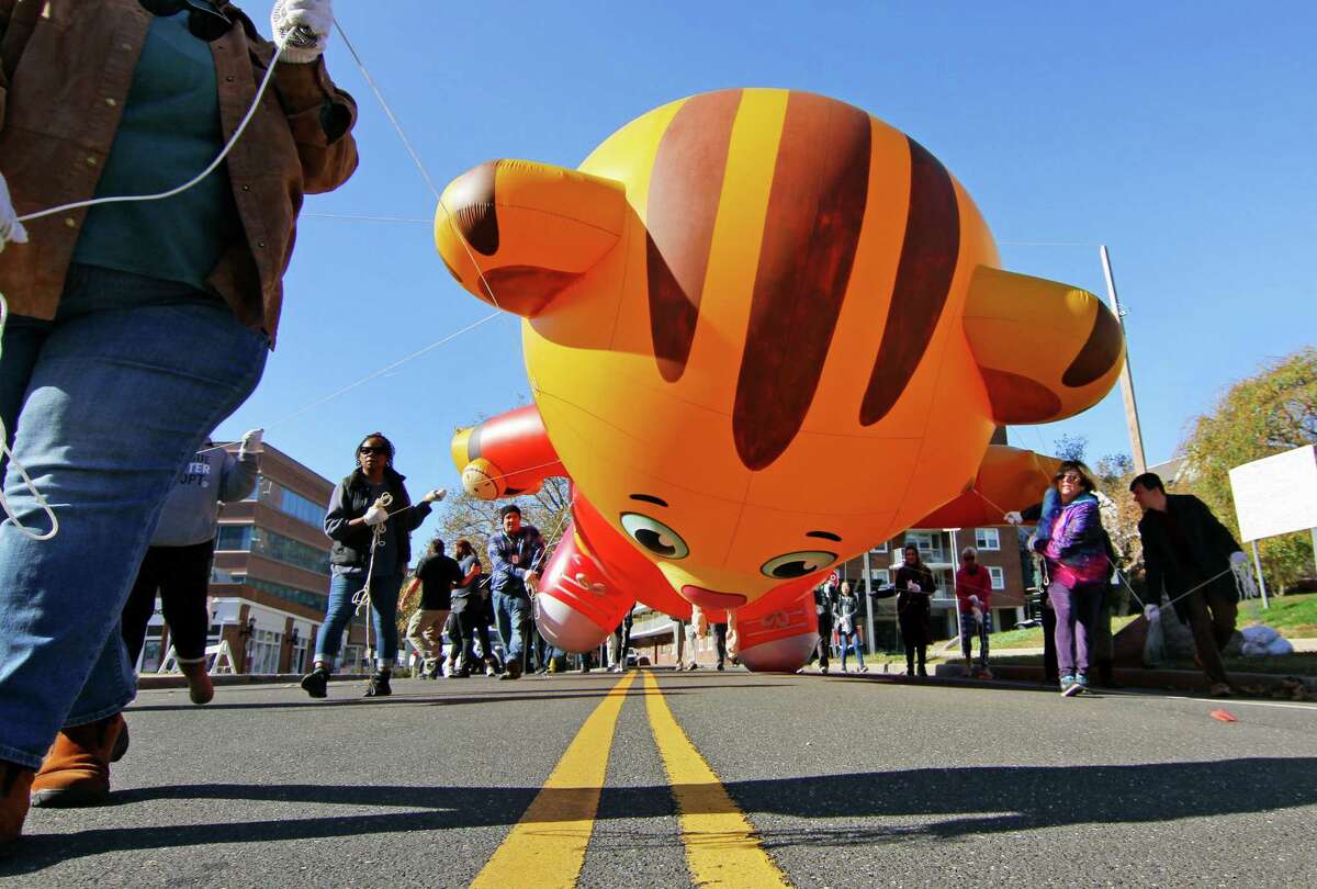 Volunteers learn to fly balloons for Stamford Thanksgiving parade