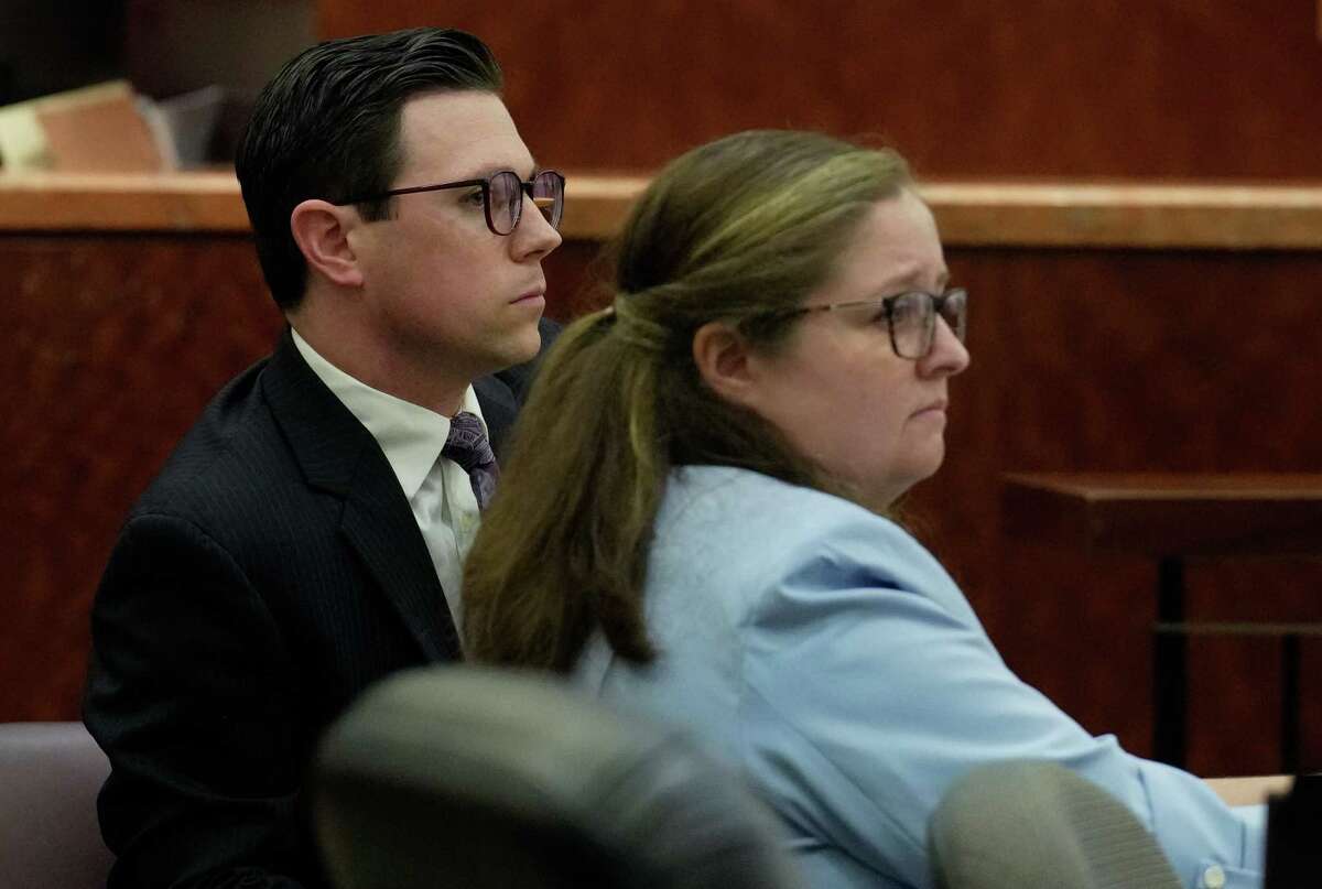 Defense attorney Wade Smith watches prosecutor Sarah Seely cross-examining defendant Robert Soliz during his murder trial Thursday, Nov. 10, 2022, at Harris County Criminal Courts at Law in Houston. Soliz is accused of killing HPD Sgt. Sean Rios in November 2020.