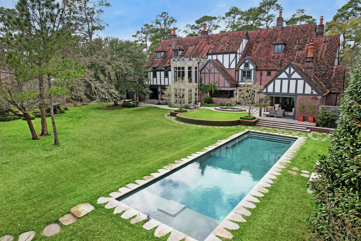 A saltwater pool is located on the 1.6 acres.