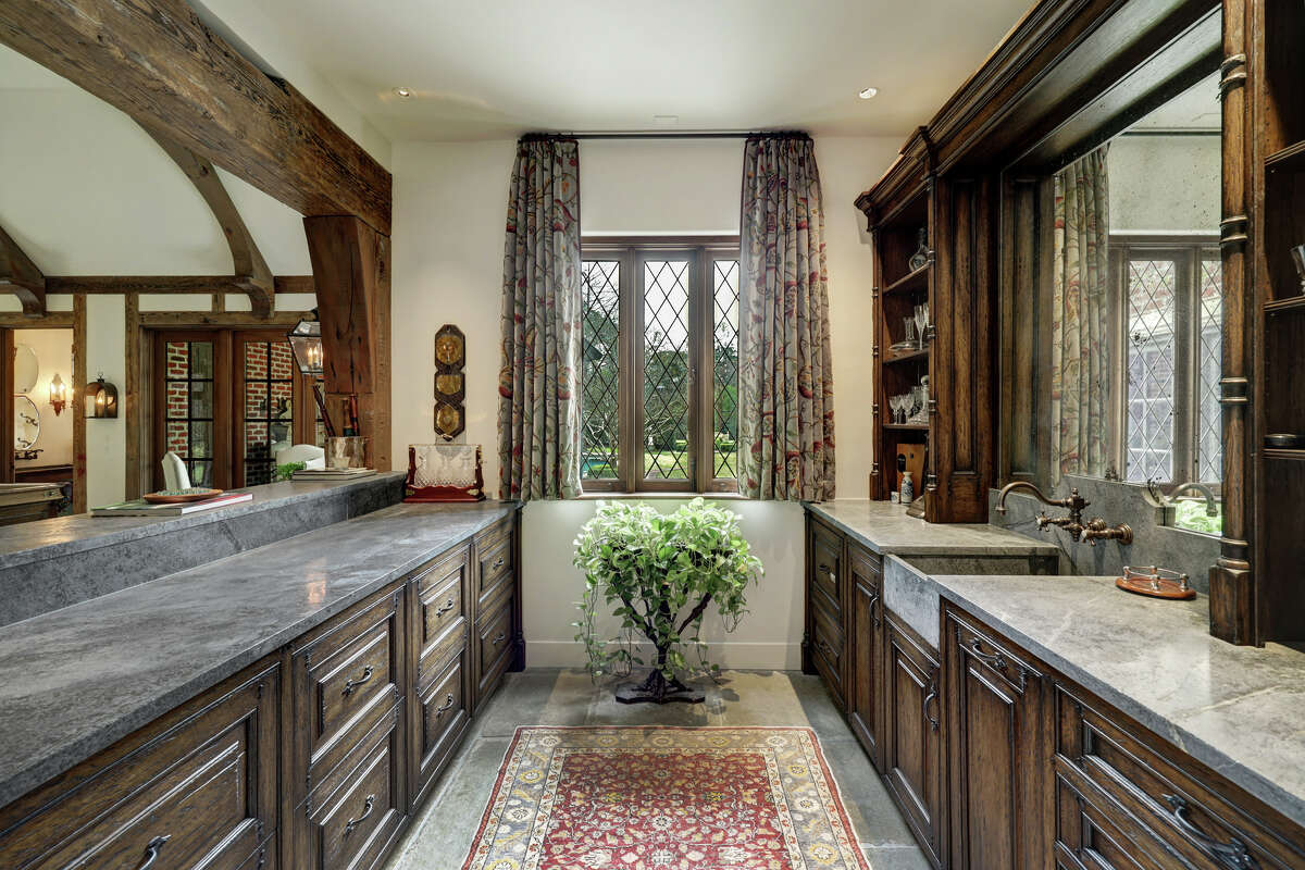 The wet bar has Marianna Soapstone countertops.