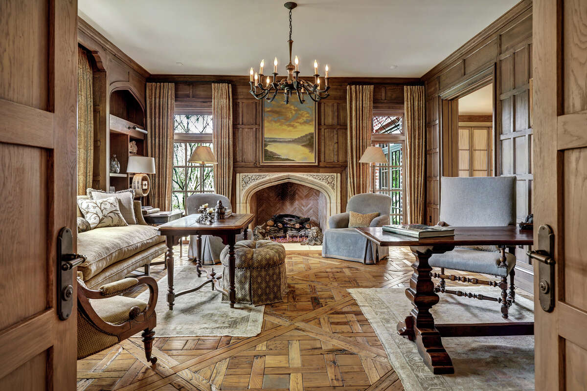 The library has hand beveled chestnut flooring and a gas fireplace for cooler nights.