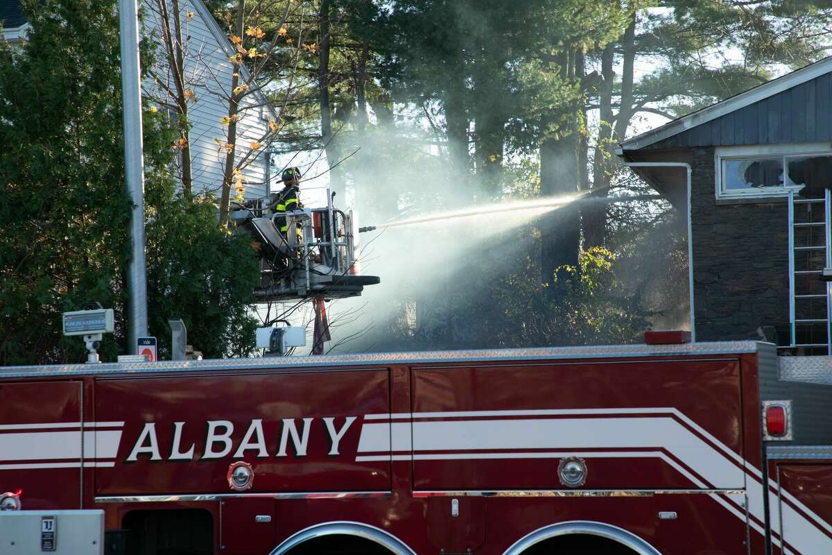 Albany firefighters battle a blaze on Hackett Boulevard on Thursday, Nov. 10, 2022. The city of Albany just lost an appeals case where they argued they could force firefighter retirees to pay for health care deductibles.