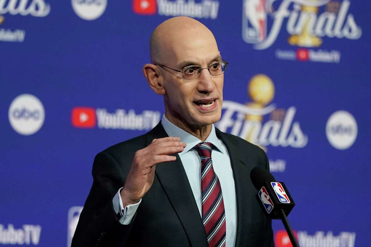 FILE -NBA Commissioner Adam Silver speaks at a news conference before Game 1 of basketball's NBA Finals between the Golden State Warriors and the Boston Celtics in San Francisco, Thursday, June 2, 2022. NBA Commissioner Adam Silver wants an apology and Kyrie Irving still isn’t going to give one. Shortly after the NBA Commissioner said Irving “made a reckless decision” by tweeting out a link to a film containing antisemitic material last week, the Brooklyn Nets guard again stopped short of saying he was sorry for doing so. (AP Photo/Jeff Chiu, File)