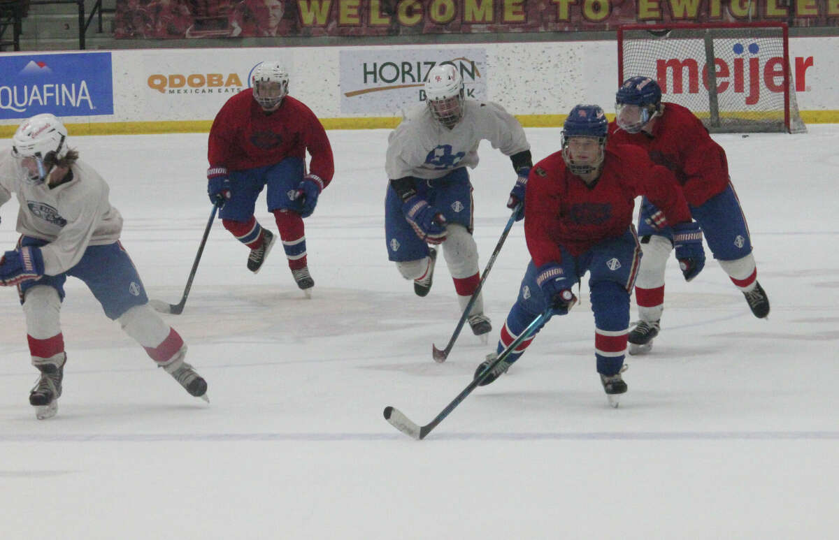 Big Rapids hockey players skate down the ice during a practice last week.