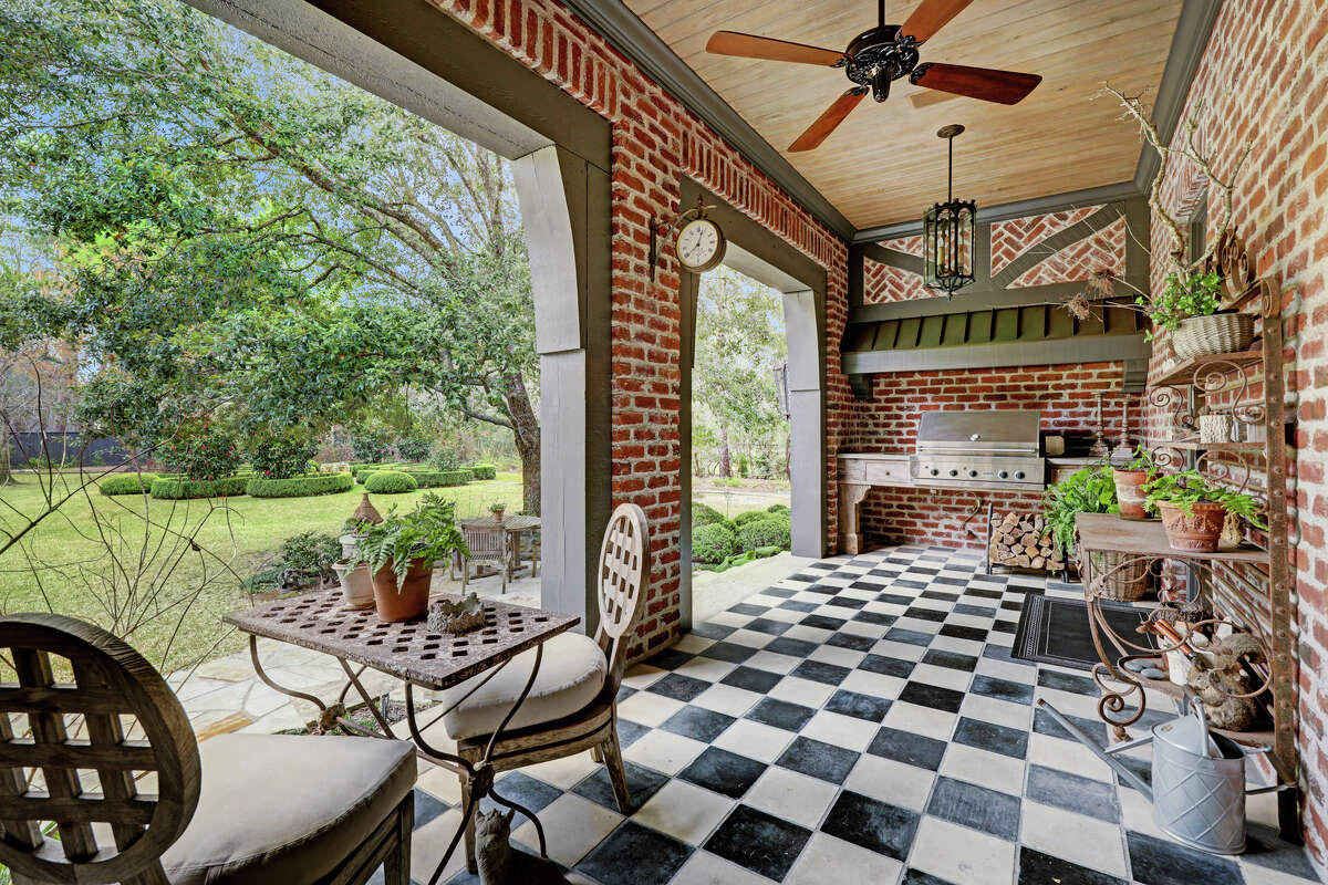 The home has two covered outdoor living spaces, including this outdoor kitchen.