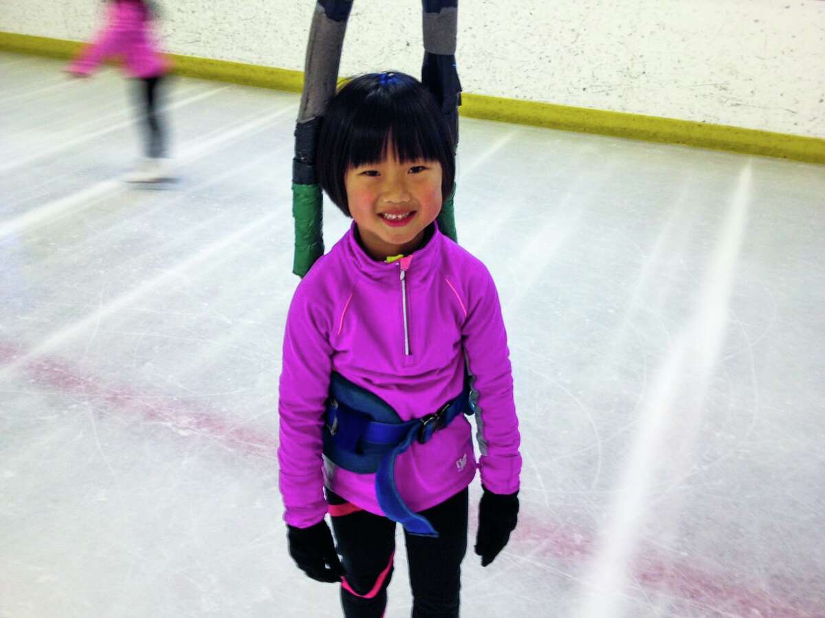 Kate Wang poses in 2012 for harness training to perform jumps on the ice rink. Wang, now 17.5 years young, is a Lowell High School student competing in the 2023 Pacific Coast Sectionals in San Francisco, an event being held November 8-13. Wang has her eyes toward nationals and potentially the Olympics. ?’Anything bad that happens, you know, in school and maybe at home, anything that's on my mind, I could just forget about when I'm on the ice,?“ Wang said. ?’I?•ve been asked if I want to go to the Olympics, and my answer is always yes, because who doesn't? But, you know, I wouldn't say it's my, like, life goal just because I think there's a lot more to life than skating at some point. I just want to keep, you know, enjoying what I do for as long as I can and I'll see where it takes me.?“