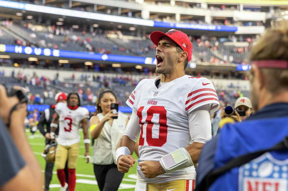 San Francisco 49ers quarterback Jimmy Garoppolo (10) celebrates after the 49ers defeat the Los Angeles Rams 31-14 in an NFL football game, Sunday, Oct. 30, 2022, in Inglewood, Calif. (AP Photo/Jeff Lewis)