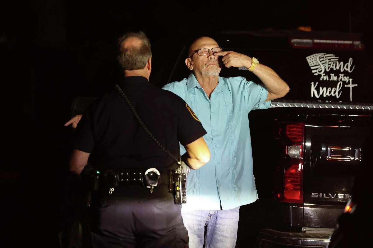 Officer William Kasberg of the San Antonio Police Department’s DWI unit gives a field sobriety test to a motorist he had stopped on suspicion of driving while intoxicated. The man failed the test and was taken into custody. “There is a big culture that involves alcohol,” Kasberg said. 