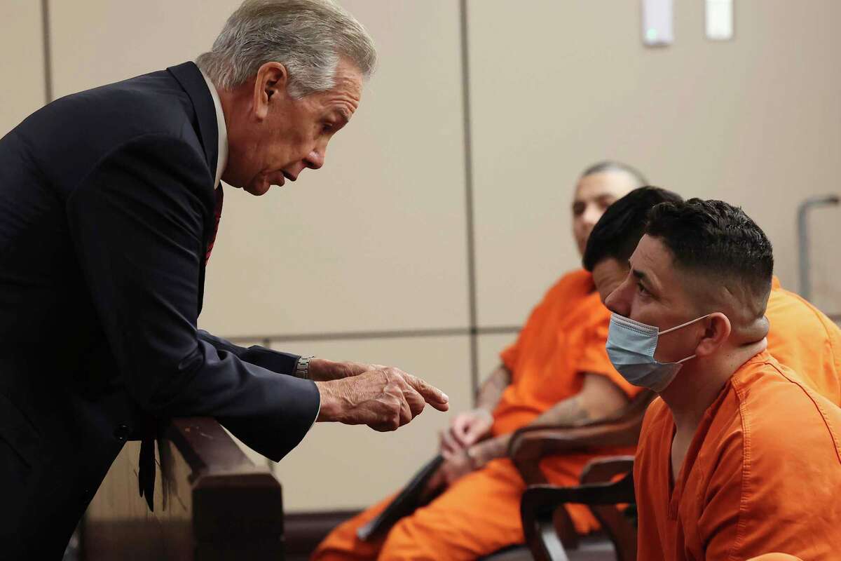 Lorenzo Caltzontzi-Jimenez speaks with his attorney, Eduardo Garcia, before a hearing in Bexar County court. On Sept. 19, 2021, Caltzontzi-Jimenez was driving while drunk when he crashed a three-ton Lincoln Navigator into a motorcycle driven by Joe Angel Garcia. Garcia suffered severe brain, spinal and other injuries. Caltzontzi-Jimenez escaped with bruises on his forearms. He pleaded guilty to intoxication assault and was sentenced to five years in prison.