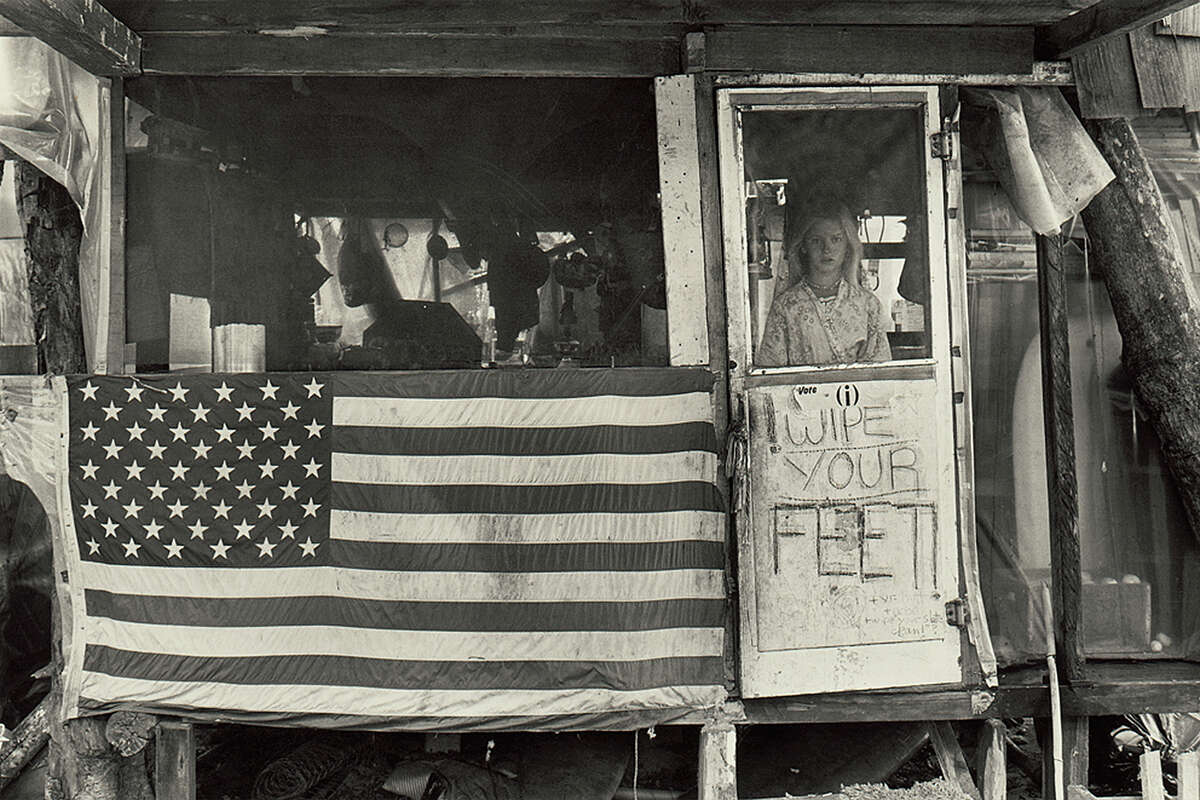 Alpin Noble at the front door of his family's home in Taylor Camp.