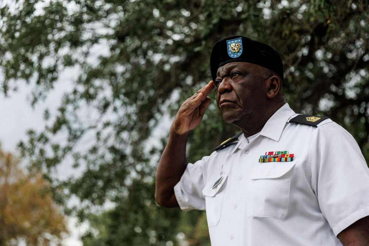 Sam Houston JROTC Instructor 1st Sgt. Donald Halford renders a salute as taps are played during the Bexar County Buffalo Soldiers Association’s Veterans Day Commemorative Ceremony at San Antonio National Cemetery in San Antonio.