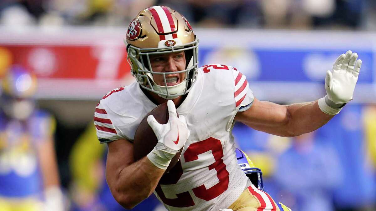 San Francisco 49ers running back Christian McCaffrey runs the ball during the first half of an NFL football game against the Los Angeles Rams Sunday, Oct. 30, 2022, in Inglewood, Calif. (AP Photo/Ashley Landis)