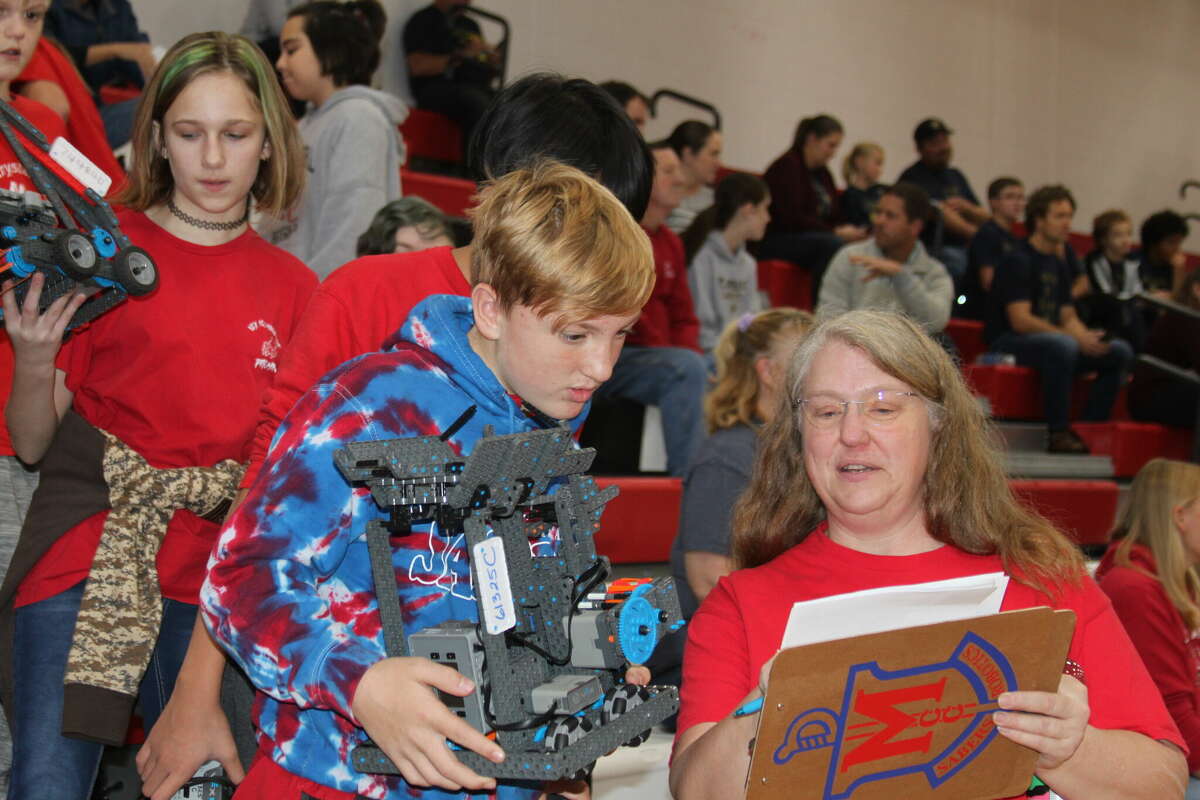Benzie Central Robotics Teams wait for their turn to compete in the VEX IQ robotics challenge. 