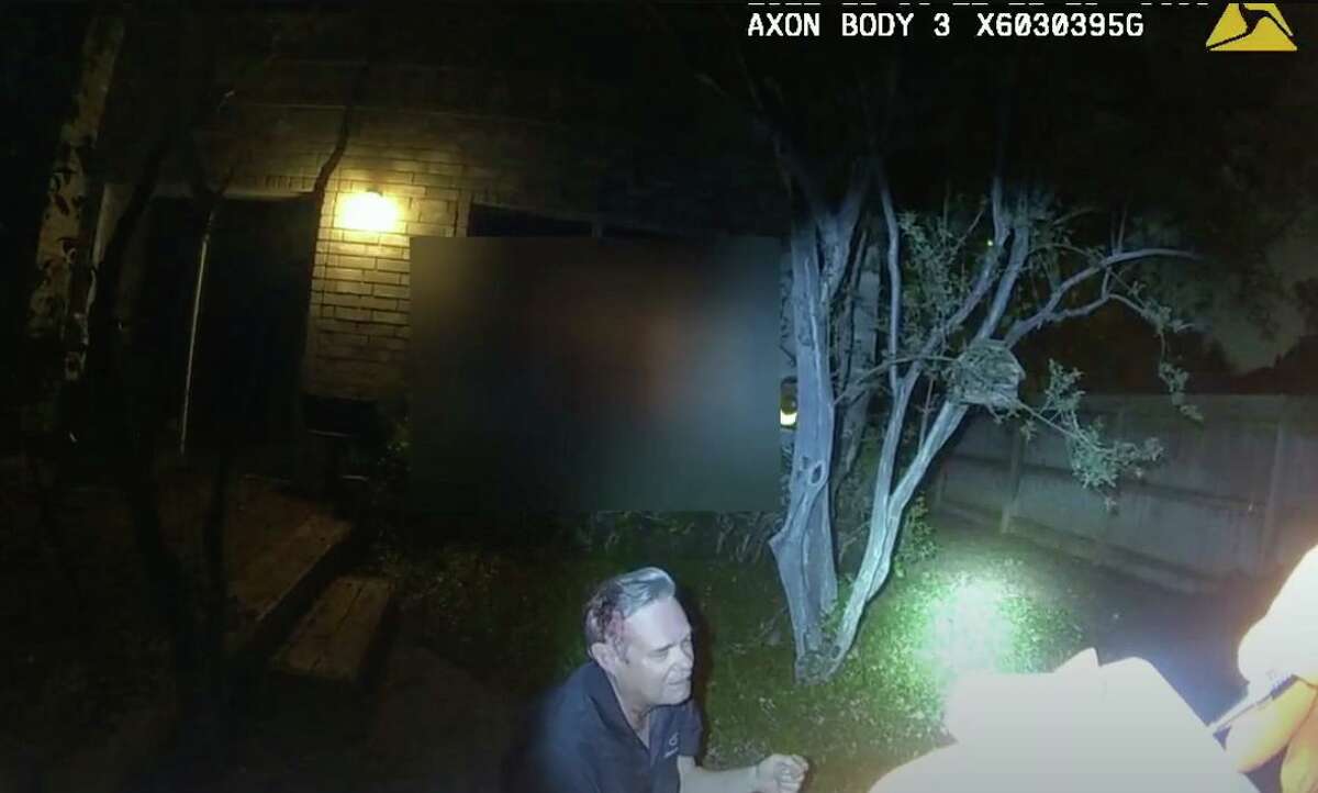 Screen grabs from the body camera of a responding SAPD officer. The video is labeled Critical Incident Video Release of Hit & Run Investigation on 11/6/22 and shows San Antonio City Council member Clayton Perry in his back yard on Nov. 6.