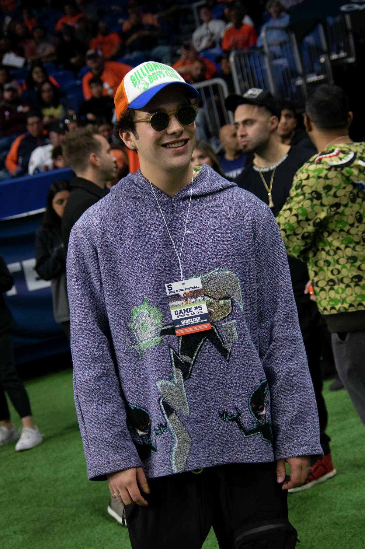 San Antonio native and singer-songwriter Austin Mahone watched the UTSA Roadrunners win over the Louisiana Tech Bulldogs from the sidelines at the Alamodome on November 12.