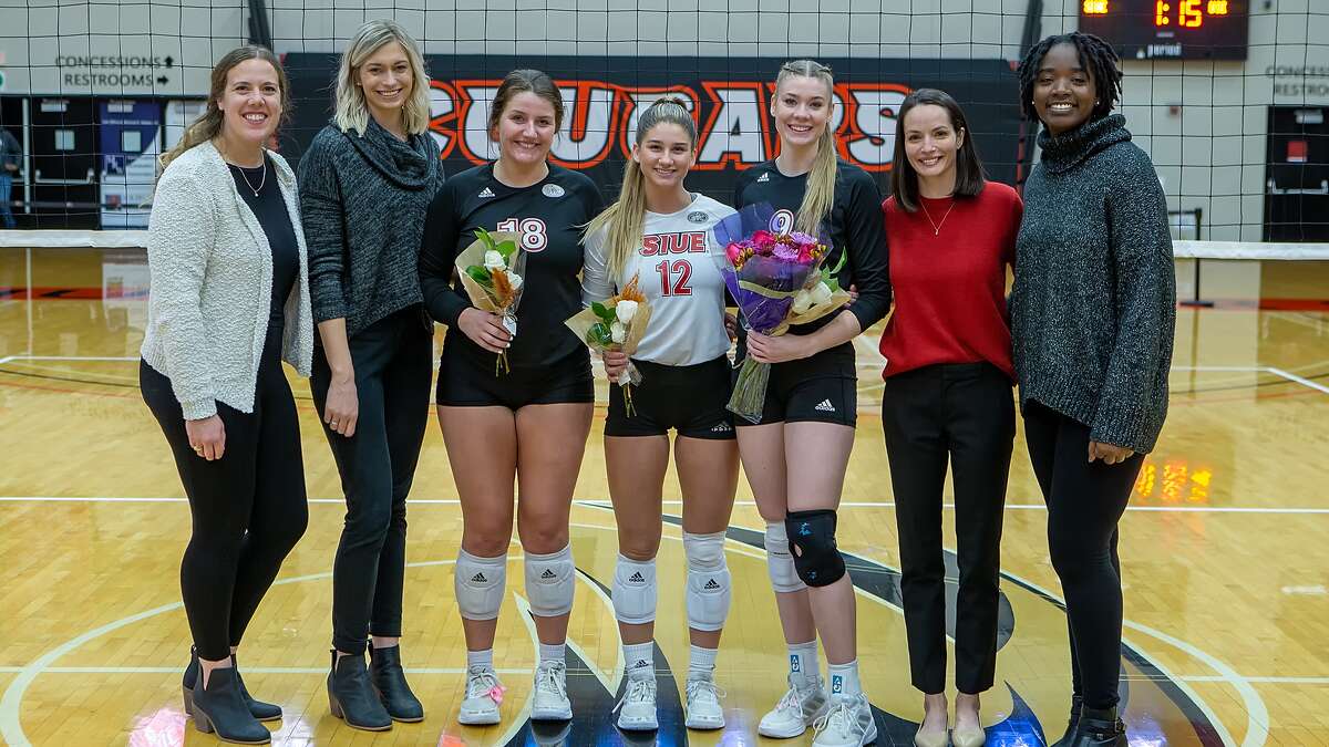 Seniors Caroline Waite, Nicole Kijowski and Jessica Vineyard were honored on Senior Day at SIUE. The Cougars beat Southern Indiana in five sets. 