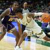 Siena’s Javian McCollum drives the ball past Albany’s Will Amica during the annual Albany Cup at MVP Arena in Albany, N.Y. on Saturday, Nov. 12, 2022. (Jenn March, Special to the Times Union)