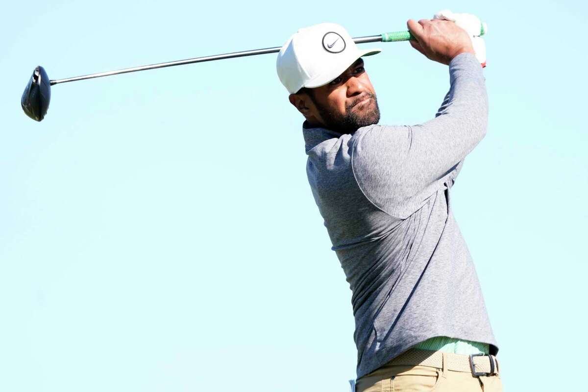 Tony Finau tees off on the fourth hole during the final round of the Houston Open golf tournament, Sunday, Nov. 13, 2022, in Houston.