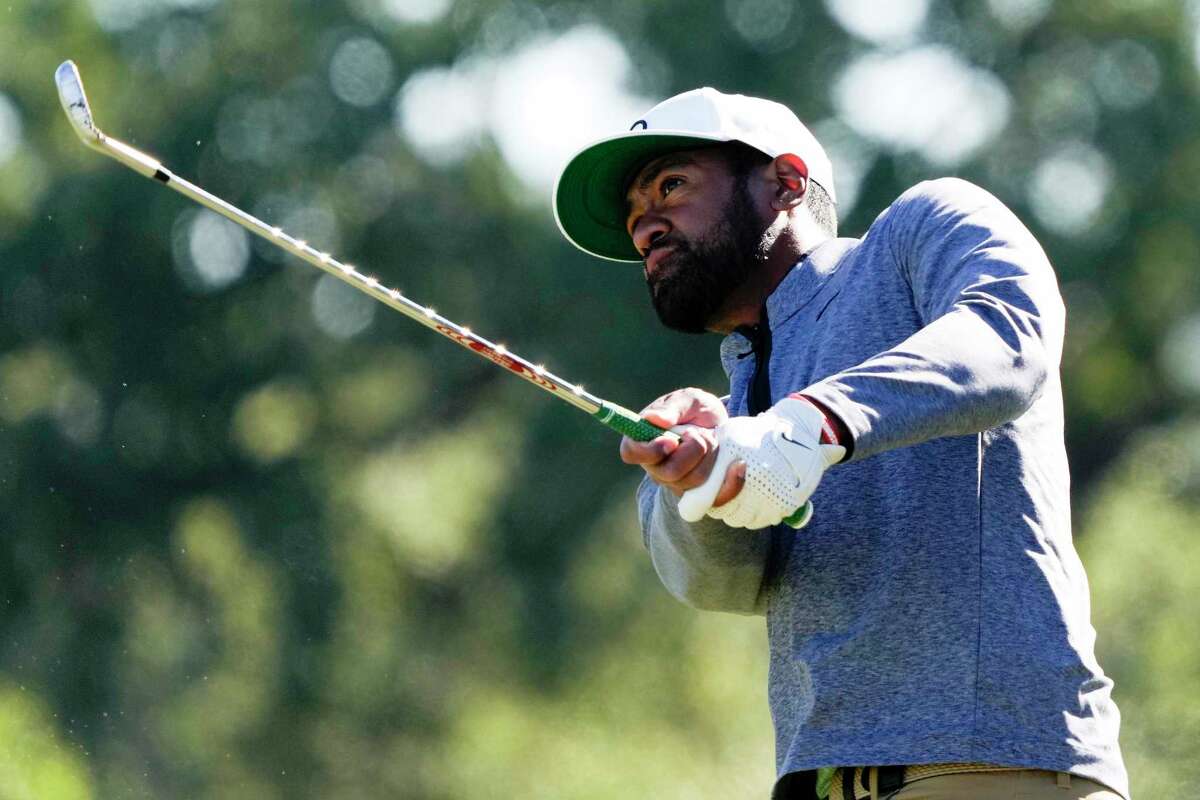 Tony Finau hits his third shot on the third hole during the final round of the Houston Open golf tournament, Sunday, Nov. 13, 2022, in Houston.