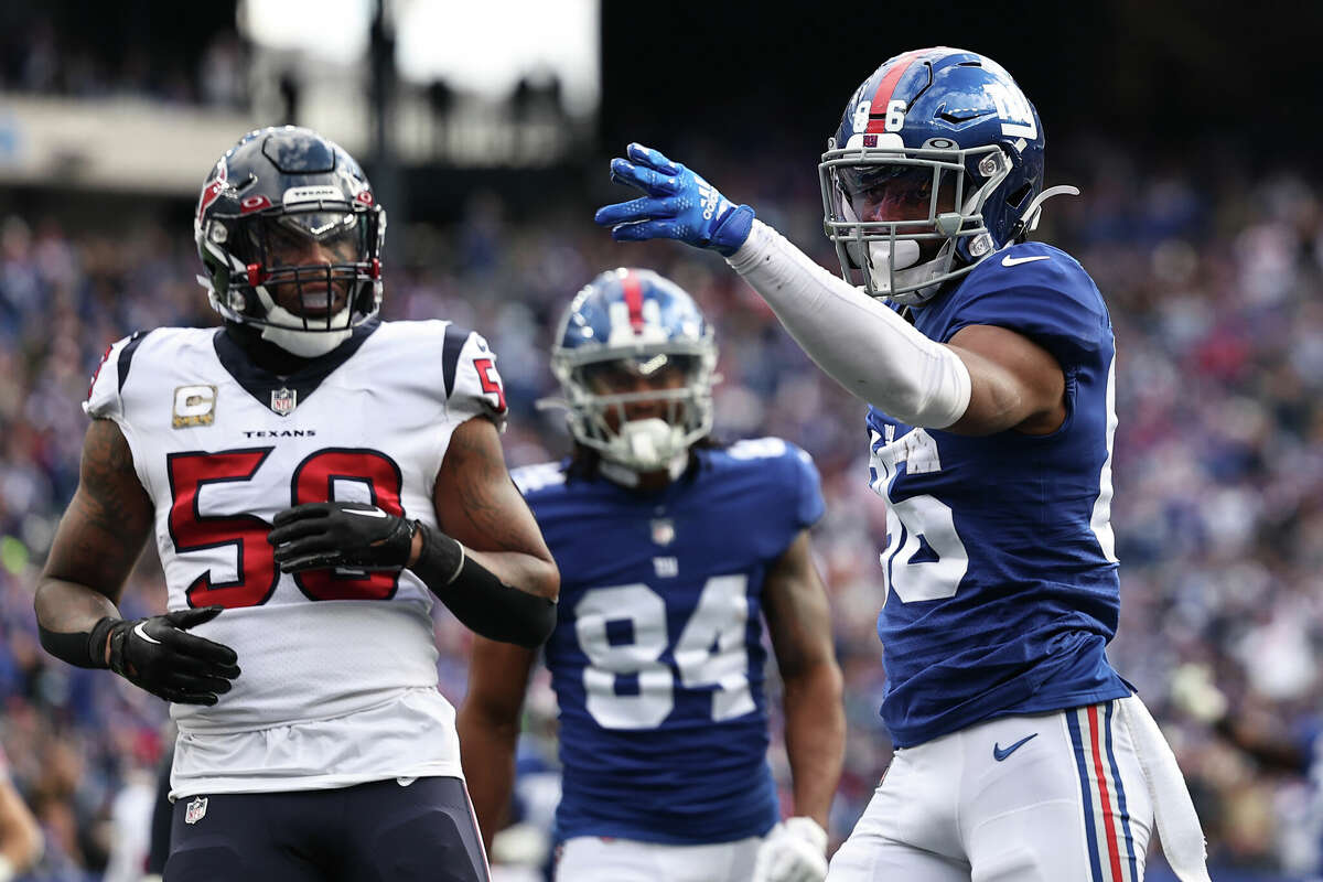 Darius Slayton #86 of the New York Giants reacts after a play during the first quarter in the game against the Houston Texans at MetLife Stadium on November 13, 2022 in East Rutherford, New Jersey.