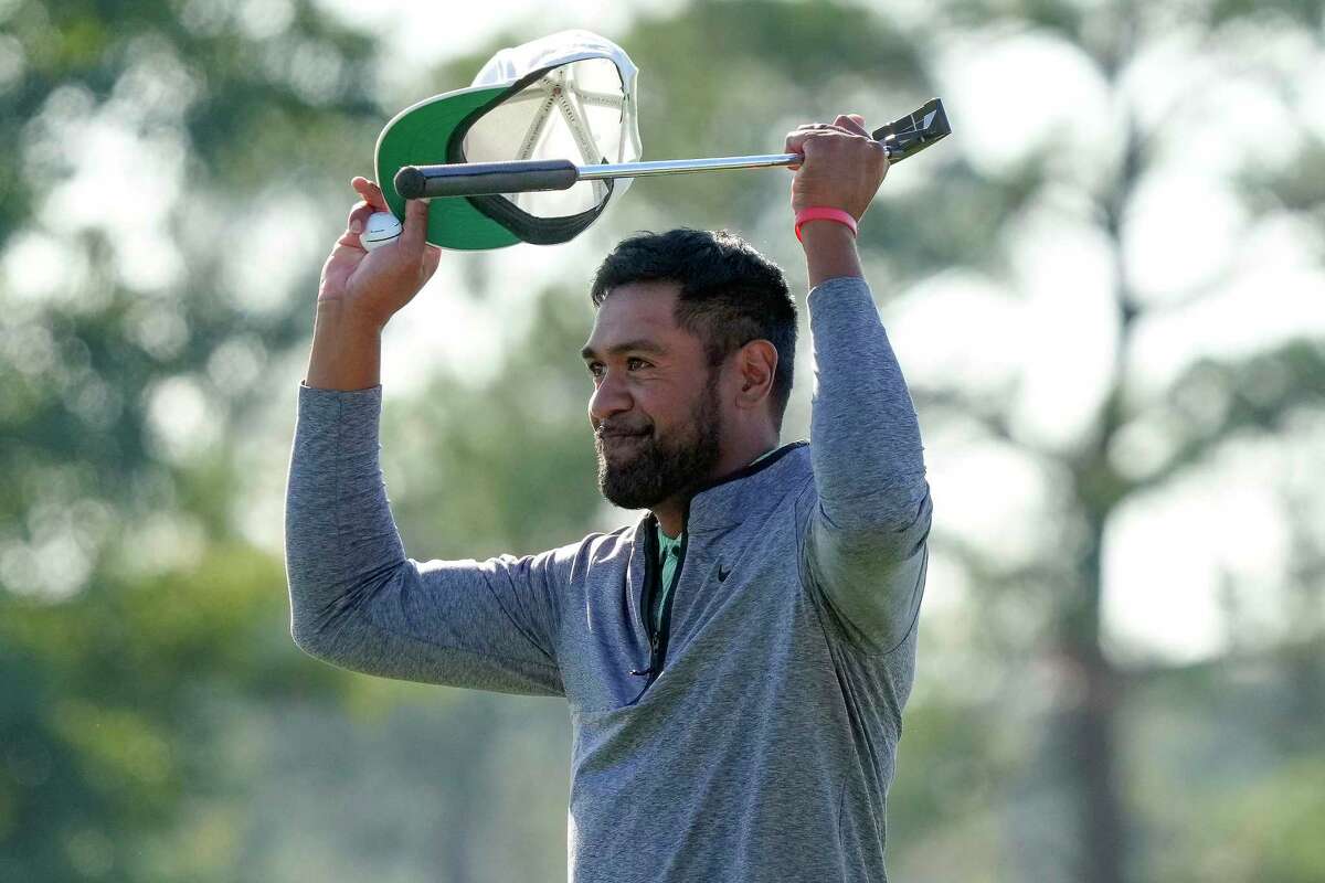 Tony Finau celebrates his win on the 18th hole during the final round of the Houston Open golf tournament, Sunday, Nov. 13, 2022, in Houston.