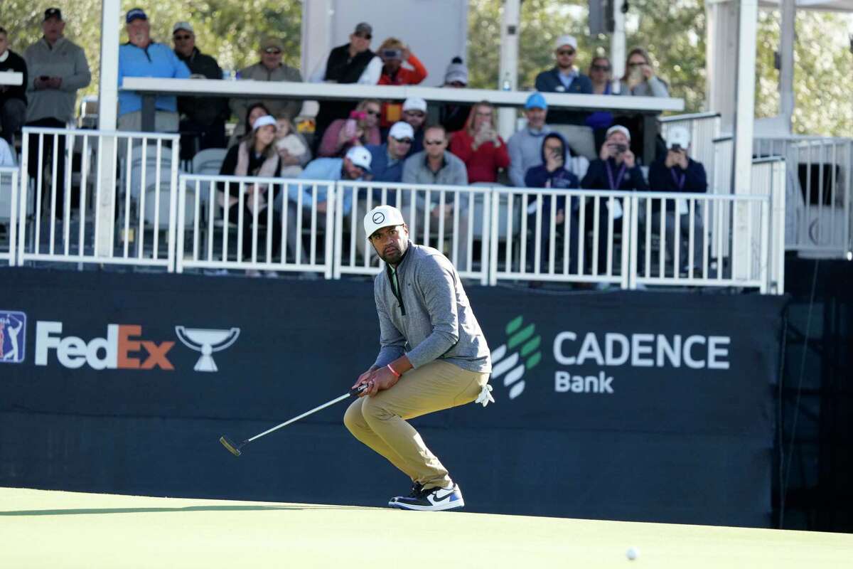Tyler Duncan watches his birdie putt attempt on the 18th hole during the final round of the Houston Open golf tournament, Sunday, Nov. 13, 2022, in Houston.