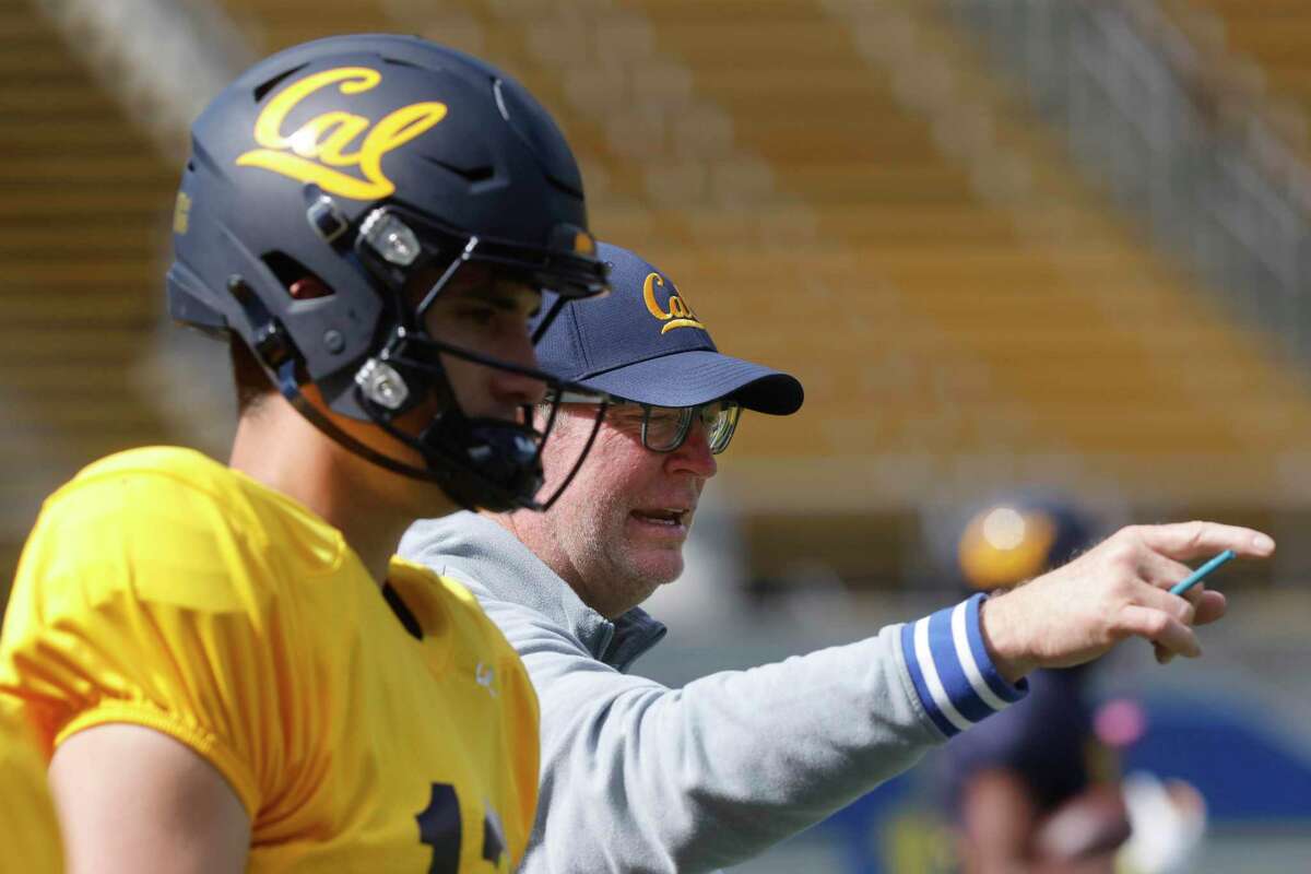 Cal fires offensive coordinator Bill Musgrave, O-line coach Angus McClure