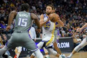 Warriors remain winless on the road, fall 122-115 to Sacramento