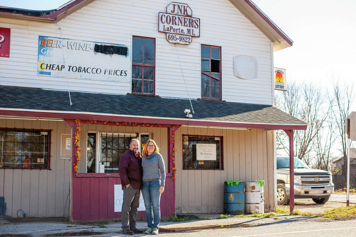 Greg (left) and Pam Gilbert poses in front of Lee's Corner Store on Nov. 7, 2022 at 3995 Smiths Crossing Road in Midland County. One of the county's oldest businesses, they hope to reopen the store in the spring of 2023.