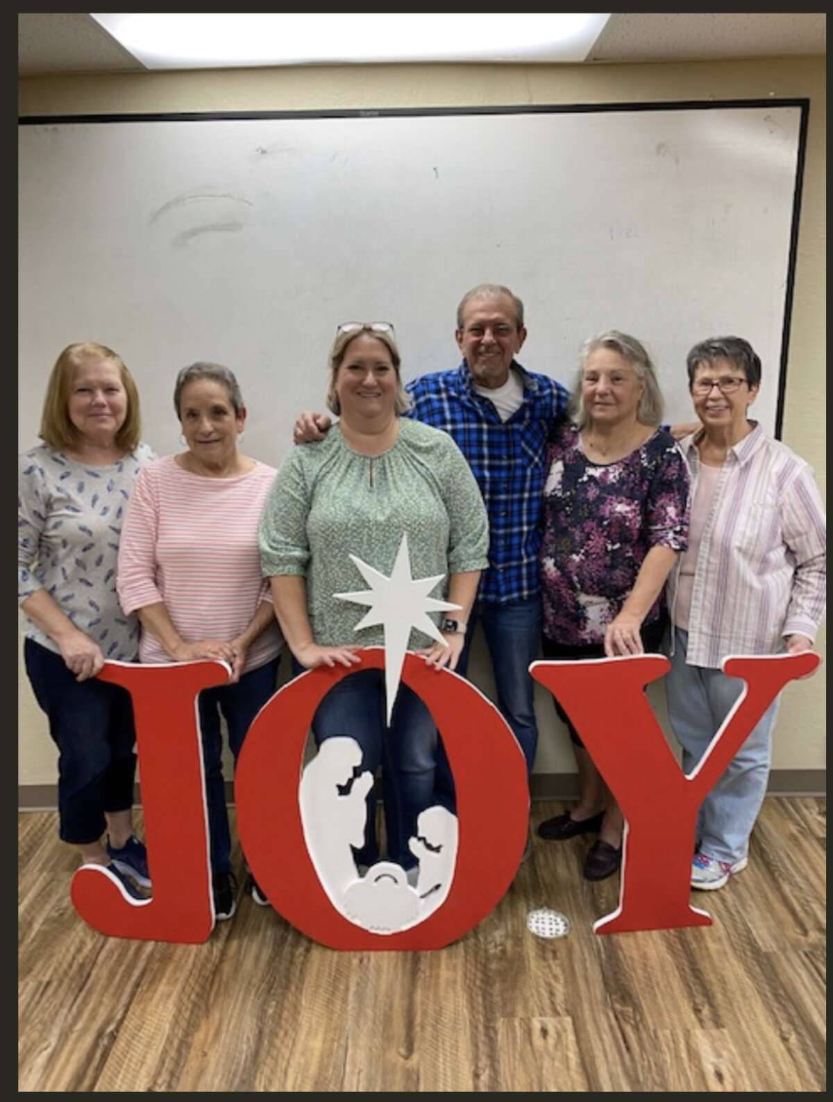 Looking forward to their Smorgasbord Dinner and Christmas Craft Bazaar at Our Lady Queen of Peace Catholic Church in Bethalto are the Planning Committee Members from Left to Right: Renee Harshbarger, Bea Albarado, Stacy Dooling, Ron Harshbarger, Fran Nappier and Dee Oller.