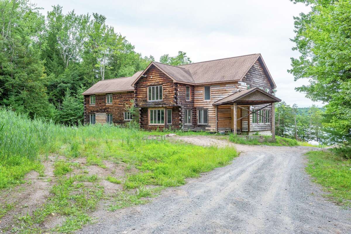 Old YMCA camp in Rensselaer County now renovated lakeside Airbnb