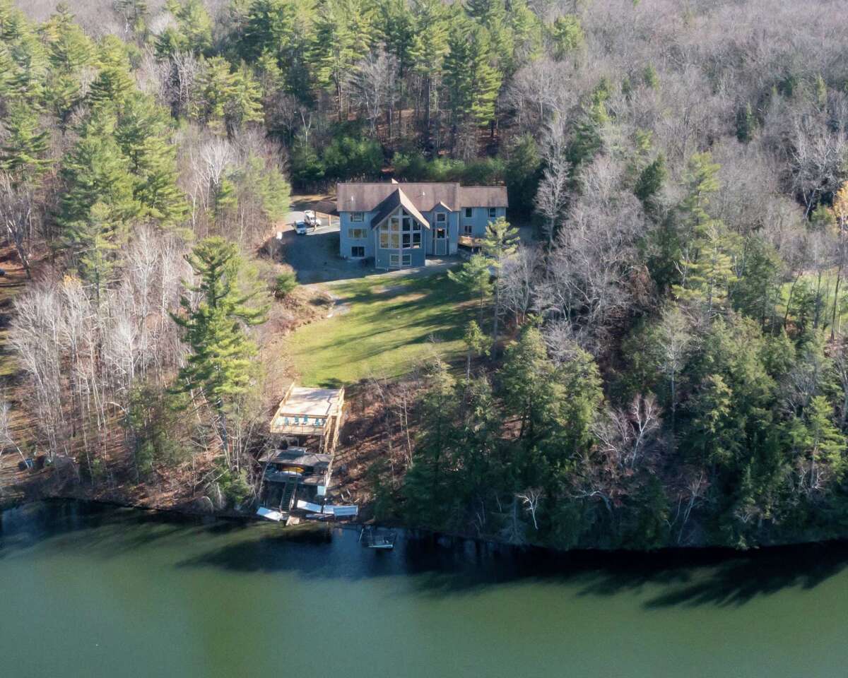 Old YMCA camp in Rensselaer County now renovated lakeside Airbnb