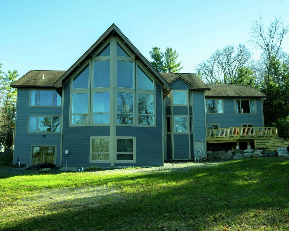 Old YMCA camp in Rensselaer County now renovated lakeside Airbnb