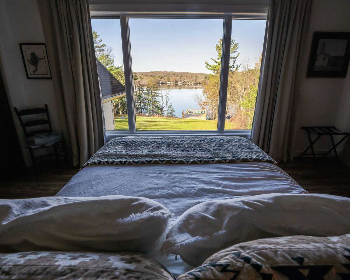 Old YMCA camp in Rensselaer County now renovated lakeside Airbnb