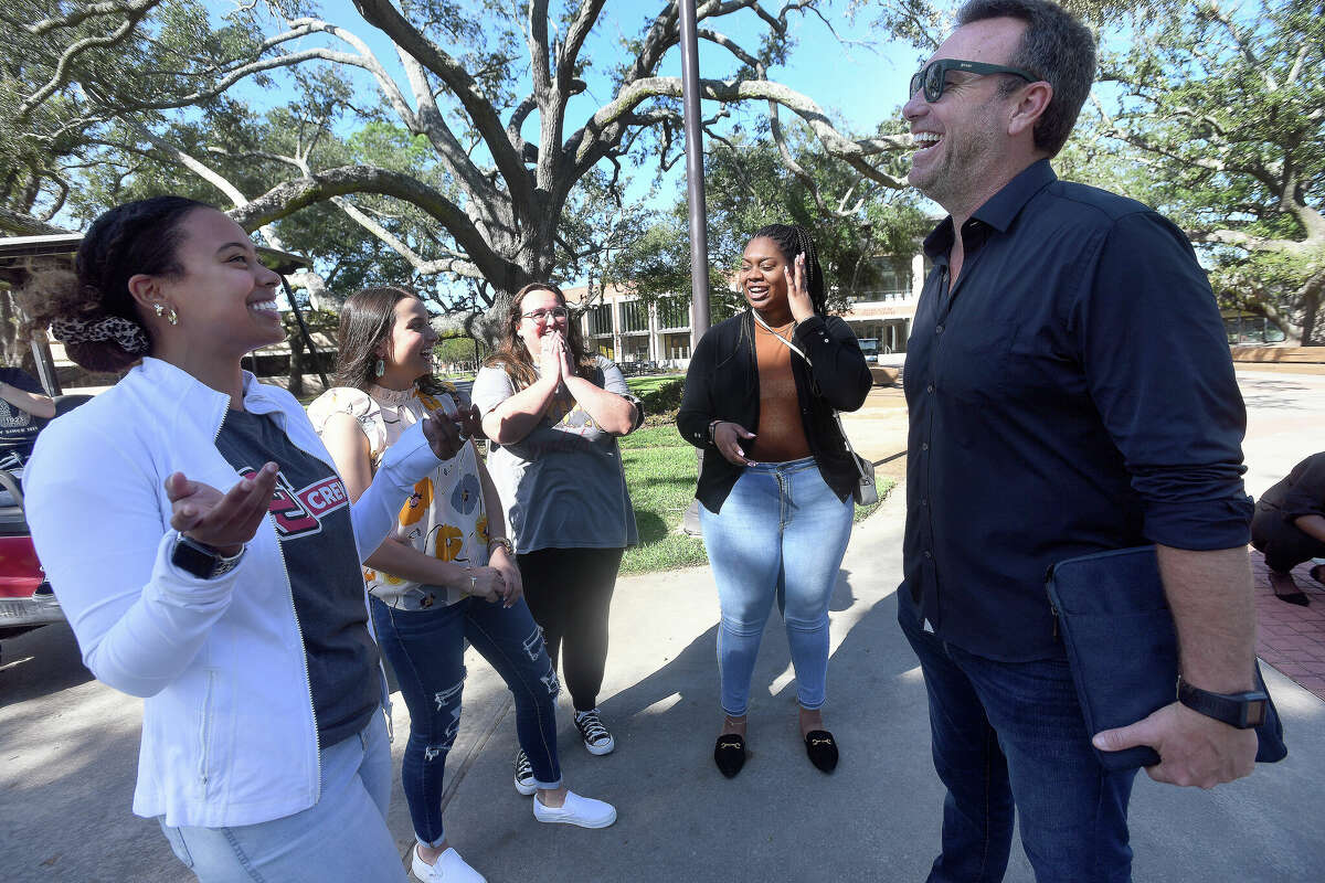 Alex Boylan, host of the reality series The College Tour, jokes with Lamar student cast members, including (from left) Allaina Melancon, Hannah Norwood, Emily Smith and Alexis Miller, after shooting his segments for an upcoming episode on Lamar's campus Tuesday. Lamar will be featured on the program, with 10 students representing a variety of aspects of academia, campus life and diversity. Photo made Tuesday, November 8, 2022 Kim Brent/Beaumont Enterprise