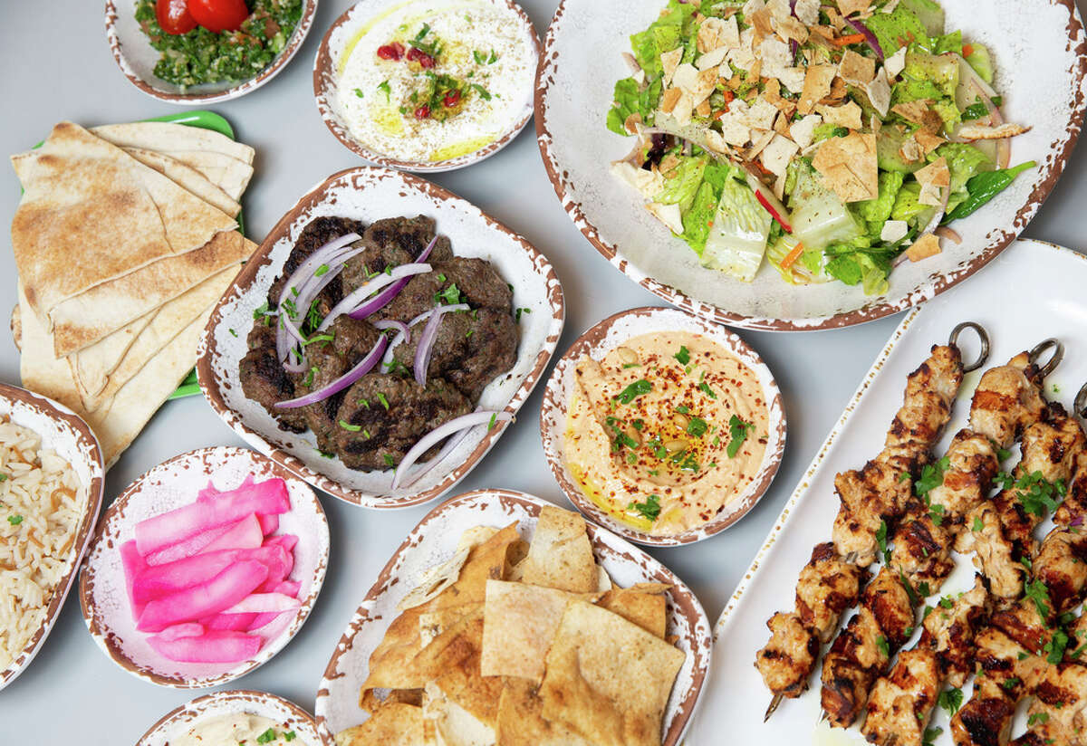 Craft Pita’s Mezze Dinner comes with chicken and beef, three spreads, fattoush salad, tabbouleh, pickled turnips, rice pilaf and homemade chips and pita bread.