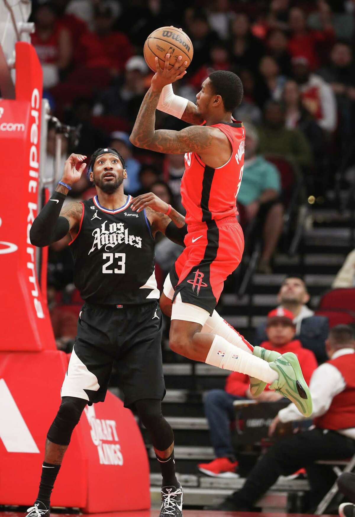 Houston Rockets guard Kevin Porter Jr. (3) goes up for a jump shot against LA Clippers forward Robert Covington (23) in the first half of game action at the Toyota Center on Monday, Nov. 14, 2022 in Houston.