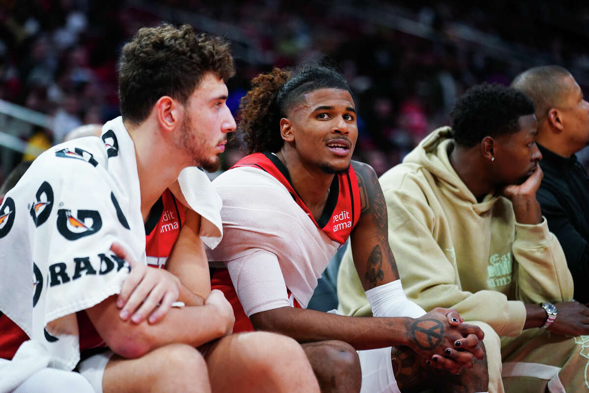 Jalen Green #4 and Alperen Sengun #28 of the Houston Rockets rest on the bench during the game against the LA Clippers at the Toyota Center on November 14, 2022 in Houston, Texas. (Photo by Alex Bierens de Haan/Getty Images)