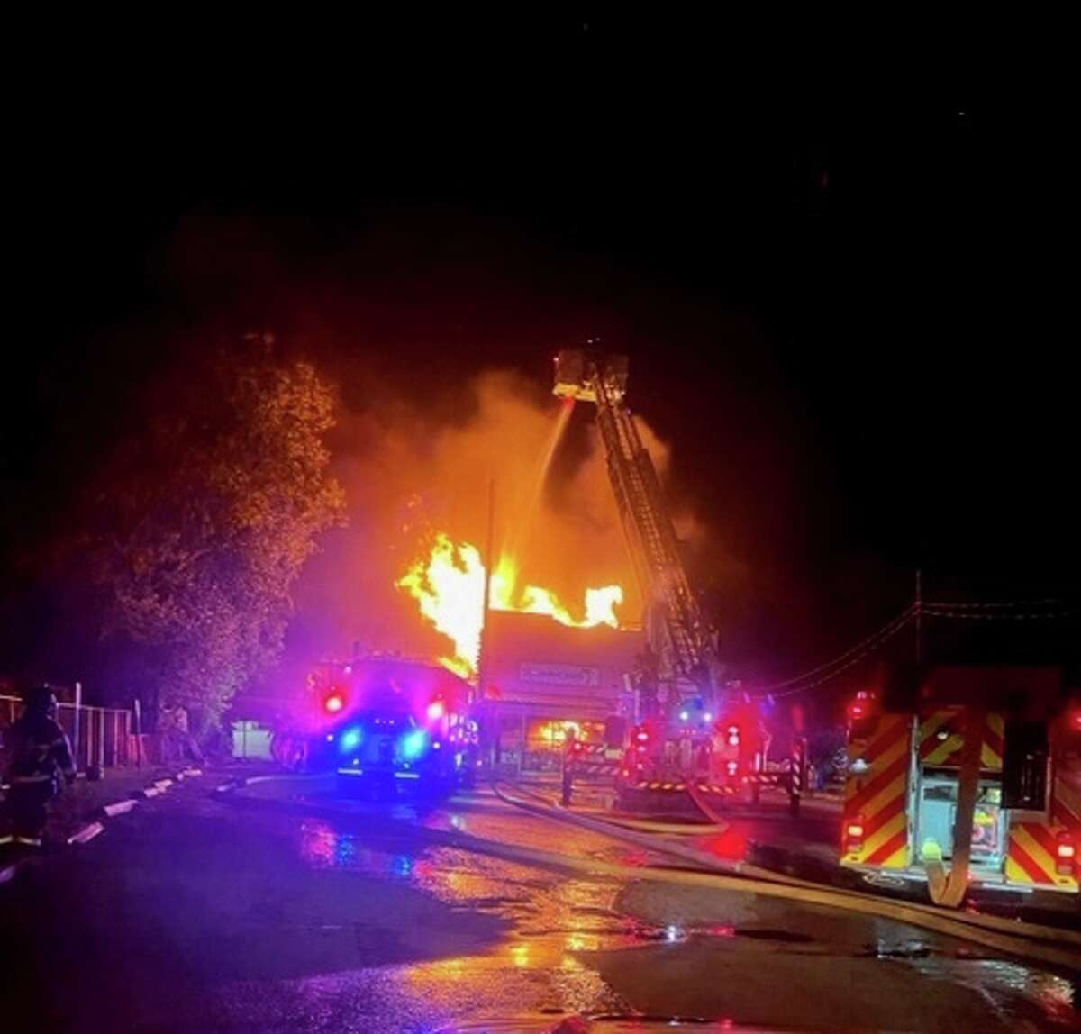 Fire ripped through the popular Cancun Mexican Restaurant in New Braunfels late Monday, causing the roof to collapse, according to the New Braunfels Fire Department. 