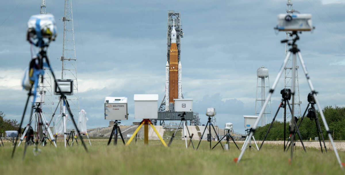 Media remote cameras are set up outside Launch Pad 39B and aimed at NASA’s Space Launch System rocket with the Orion spacecraft on top as preparations for launch continue, Sunday, Nov. 13, 2022, at NASA’s Kennedy Space Center in Florida.